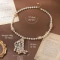 Detailed macro view of vintage pearl tassel necklace with size and weight specifications - 18K Gold / White Pearl Tassel Heavy Craft (N6-13648-28000)