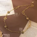 Detailed view of the 2.0cm textured stone pendant and gold chain on this vintage necklace. - 18K Gold / Gold Rock Pendant Thick Chain (N6-13658-16000)
