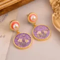Elegant vintage court style drop earrings with purple floral enamel and pearl accents. - Purple Enamel Floral Vintage Earrings (2-27222-8200)