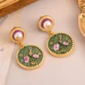 Elegant retro palace style earrings with pink floral patterns and pearl accents on gold frame. - Dark Green Pink Floral Vintage Earrings (2-27223-8200)