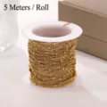 Detailed view of 5-meter roll of gold stainless steel beaded curb chain for DIY jewelry. - 1.5mm * 5 Meters / Roll / Gold