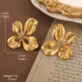 Vintage matte gold flower earrings with hammered texture and small crystal centers - Golden Hammered Petal Style (2-25756B-5500)