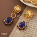 Vintage gold-tone textured dome clip-on earrings featuring elegant blue teardrop stones - Deep Blue Gemstone Water Drop Ear Clip Style (E4-21277-7500)