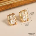 Élégantes boucles d'oreilles évidées en or avec perles baroques et strass, poids de 5g. - Style Baroque Ajouré Géométrique (2-22676A-5800)