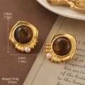 Vintage gold-tone stud earrings featuring tiger eye stone and small pearl accents. - Vintage Shield Flower Style (E4-21559B-5800)
