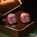 Close-up macro shot of purple floral enamel earrings showing specific dimensions and weight - Oval Purple Floral (E4-21990A-6000)