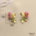 Close-up detail of enamel flower drop earrings with dimensions and weight labels - 一对装(3.0cmx1.55cm)