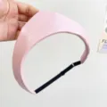Detailed view of pink leather crown headband with adjustable elastic strap - Adjustable Size / Pink
