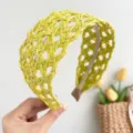 Close-up of bright yellow woven wide headband showing textured straw-like pattern - Braided Headband / Yellow