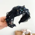 Detailed view of a black mesh top-knot headband decorated with colorful rhinestones - Black Mesh Rhinestone Headband (S217)