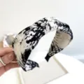 Detailed view of black and white tie-dye knotted wide fabric headband for women - Knot Headband / Black and White Tie-Dye Knot Headband
