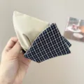 Close-up detail view of a navy blue plaid and beige fabric knotted headband accessory. - Beige Patchwork Hair Claw / Navy Plaid
