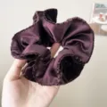 Detailed close-up of a deep purple satin scrunchie with soft velvet textured edges - Pleated Slim Scrunchie / Deep purple