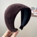 Detailed macro view showing the plush velvet texture of the brown sponge headband. - Wide Headband / Dark Brown