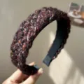 Detailed view of a chunky mixed-color knit wide headband with soft and cozy wool texture - Knitted Headband / Red Brown