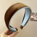 Side view of an elegant brown velvet padded headband with a soft inner lining. - Coffee Blue Contrast Wide Velvet Headband