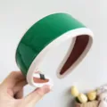 Macro detail of a green vintage PU leather wide headband with elegant white stitching - Leather Wide Headband / Green