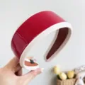 Close-up detail of vintage red patent leather headband with cream stitched border - Leather Wide Headband / Red
