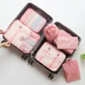 Reise Packtaschen 7er Set rosa wasserdichte Koffer Organizer Taschen für Kleidung und Zubehör. - Verdicktes 7-Teiliges Set / Wassermelonenrot
