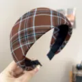 Close-up of a wide vintage brown plaid fabric headband with elegant blue and white stripes - Wide Headband (S397) / Coffee Plaid