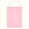 Close-up detail of a pink felt jewelry display hanging board for brooch storage - Hanging Display Style / Pink