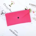 Detailed close-up view of a vibrant pink felt multipurpose storage pouch with snap button - Rose Red