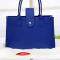 Durable blue felt tote bag with handles and snap closure for travel and shopping use - Blue