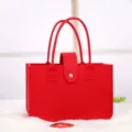 Red felt storage handbag with top handle and snap button closure for shopping - Red