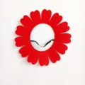 Detailed view of the vibrant red felt sun flower accessory with heart-shaped petals - Small Sunflower / Red