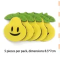 Detailed view of yellow pear-shaped felt patches with smiley faces and leaves for crafts. - Pear / 5 Pieces