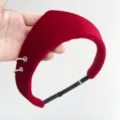 Close-up of a red velvet padded headband featuring decorative silver rings and soft texture. - Crown Ring Hairband / Adjustable Size / Red
