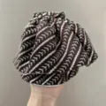 Close-up of brown headband with white striped embroidery and silver sequins - Skirt Style Scrunchie / Coffee Sequins