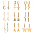 Detailed collection of 9 pairs of gold zinc alloy earrings featuring celestial and geometric charms - 9 Pairs Set / Gold