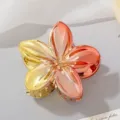 Glossy metallic gradient frangipani flower hair claw clip for elegant updos and styling - Yellow + Bright Red (3780)