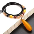 Ethnic vintage long sweater chain featuring a yellow faux amber teardrop pendant - F0168 Cylinder