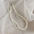 Élégant collier double couche en perles d'imitation blanches style rétro pour femmes - Chaîne de Clavicule en Perles à Double Rang (54207)