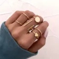 Set de 6 anillos dorados minimalistas con diseños de corazón y geometría en la mano. - Aleación / Estilo de corazón de 6 piezas (54414) / Dorado