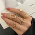 Elegante juego de 11 anillos dorados con motivos geométricos y de hojas para mujer - Aleación / Estilo de hoja de 11 piezas (54478) / Dorado