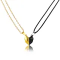 Pair of magnetic heart pendant necklaces for couples in contrasting black and gold colors - 5301104 (Gold And Black Heart Set)