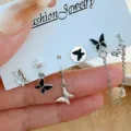 Ensemble de boucles d'oreilles papillon argentées avec détails en émail noir style dark cool - Ensemble Ligne d'Oreille Papillon Noir Argent (5689401)