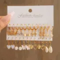 Ein 12-teiliges Set goldener Creolen mit Anhängern wie Perlen, Herzen und Muscheln - Gold 12-Teiliges Schmetterling Muschel Pilz Kreativ Ohrring Set (5598603HB)