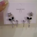 Gothic Silber Ohrring Set mit Schmetterling, Stern und Kreuz Anhängern im dunklen Stil - Dunkler Stern Schmetterling Set (5818401)