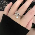 Verstellbarer Ring in Silberoptik mit funkelndem Sternanhänger im Retro-Stil - Doppelstern Strass Anhänger (5653701) / Silber