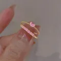 Elegant gold open knuckle rings featuring a pink heart stone and a dainty rhinestone band - Pink Heart Rhinestone Style (5690205) / Gold & Pink