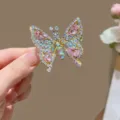 Beautiful sparkling butterfly hair clip with pink rhinestones and gold-tone frame - Pink (3301-3)