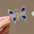 Elegant moving butterfly hair clip with shimmering blue rhinestones and gems detail - Royal Blue (3301-4)