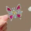 Sparkling rhinestone butterfly hair clip in gold with magenta accents - Rose Red (3301-5)