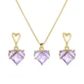Detailed view of gold-tone jewelry set with faceted purple heart stones - Purple Heart (Gold Chain)