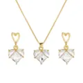 Detail view of heart-shaped clear crystal necklace and earrings jewelry set in gold. - White Heart (Gold Chain)