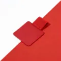 Porte-stylo autocollant en cuir rouge avec bande elastique pour cahiers et carnets. - Cramoisi
